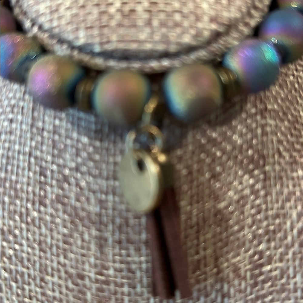 Hand Crafted Iridescent Green Purple Blue Beaded Bracelet with Brown Tassel - Picture 3 of 3